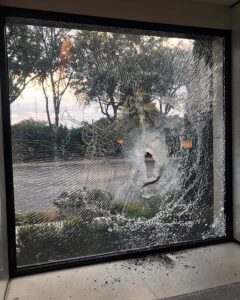 Business breakin attempt foiled by shatterproof window film.