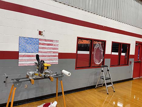 Riot Glass installation in progress for student protection.